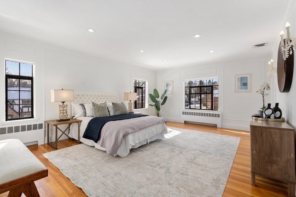 48 Gralynn Road Newton, MA 02459 - Photo 15 of 30 a bedroom with furniture and a flat screen tv