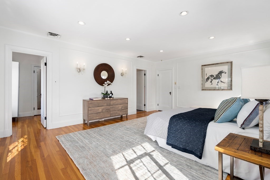 48 Gralynn Road Newton, MA 02459 - Photo 16 of 30 a bedroom with a bed and wooden floor
