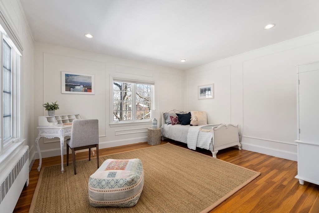 48 Gralynn Road Newton, MA 02459 - Photo 18 of 30 a living room with furniture and a wooden floor