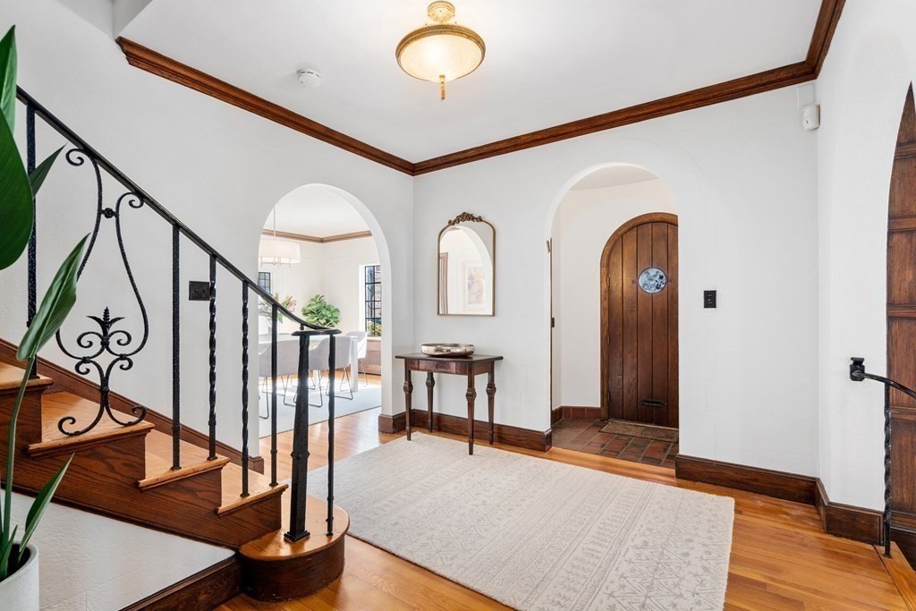 48 Gralynn Road Newton, MA 02459 - Photo 7 of 30 a view of an entryway with wooden floor and front door