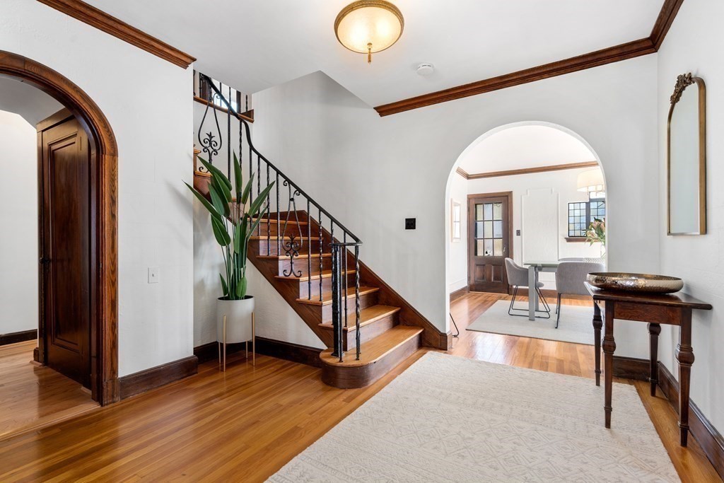 48 Gralynn Road Newton, MA 02459 - Photo 8 of 30 a view of entryway and hall with wooden floor