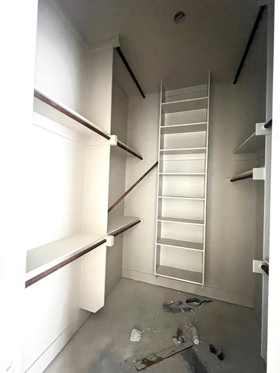 1390 Poe Prairie Road Millsap, TX 76066 - Photo 20 of 40 a view of walk in closet with empty racks