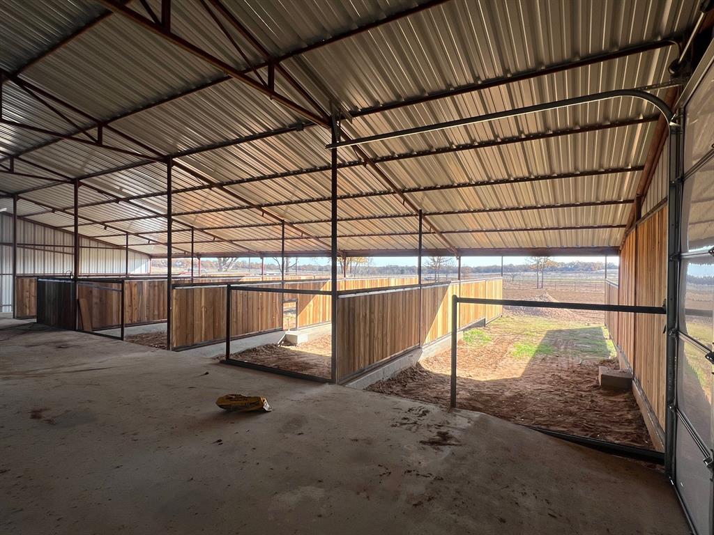 1390 Poe Prairie Road Millsap, TX 76066 - Photo 28 of 40 a view of a room with wooden floor