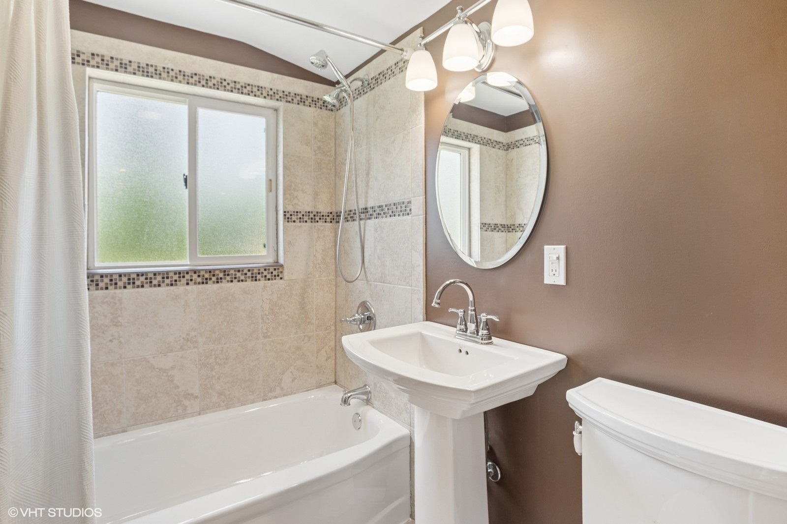 3N276 North Howard Avenue Elmhurst, IL 60126 - Photo 16 of 29 a bathroom with a sink a toilet and a mirror