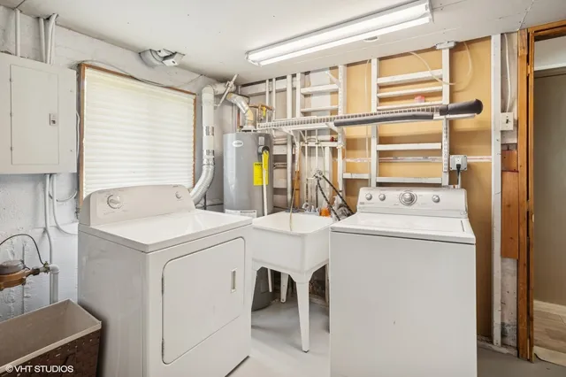 a utility room with dryer and washer