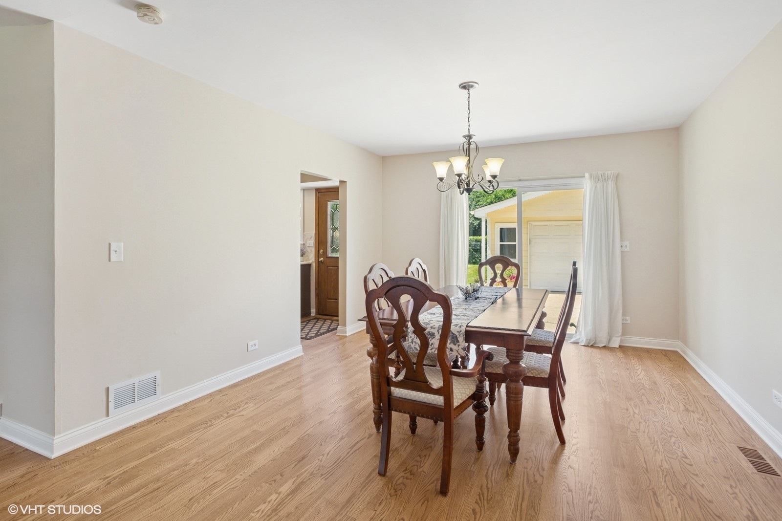 3N276 North Howard Avenue Elmhurst, IL 60126 - Photo 7 of 29 a dining room with furniture window and wooden floor