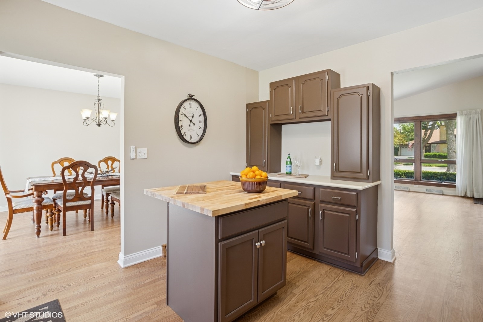 3N276 North Howard Avenue Elmhurst, IL 60126 - Photo 9 of 29 a kitchen with a sink cabinets and wooden floor