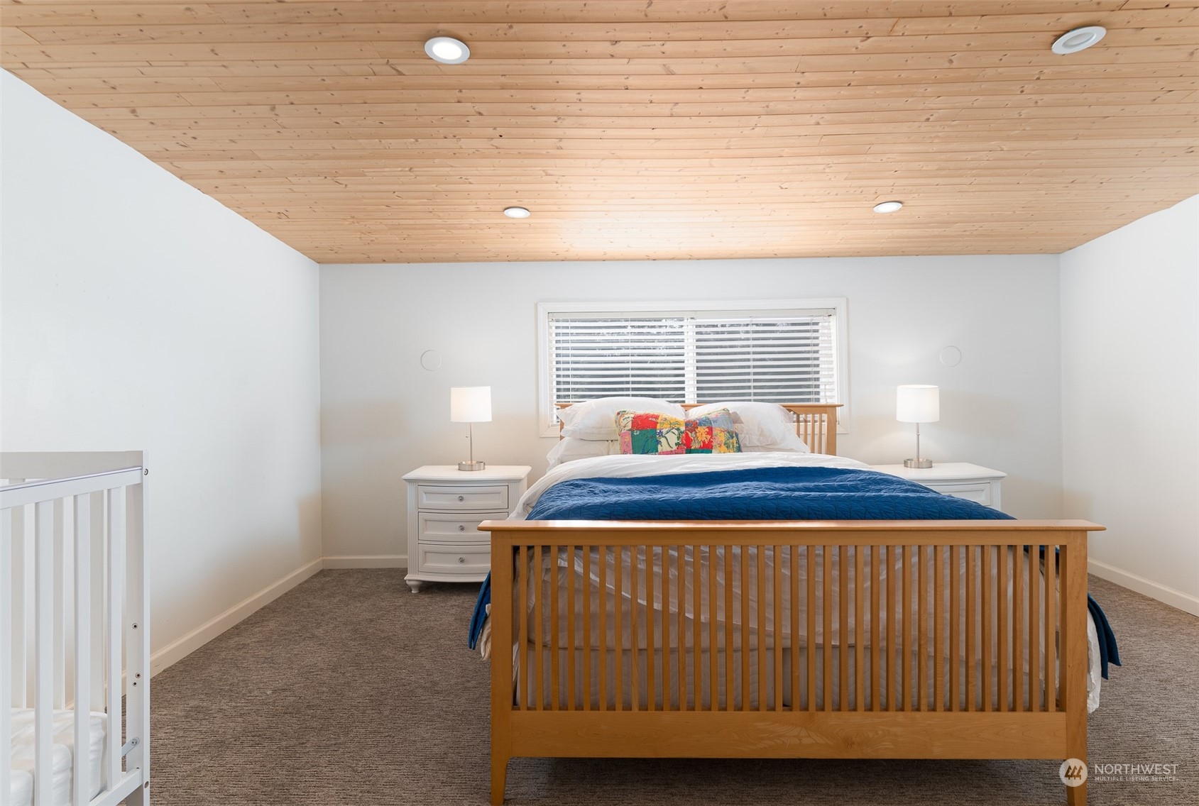 5757 Barr Road Ferndale, WA 98248 - Photo 17 of 40 a bedroom with a bed and window