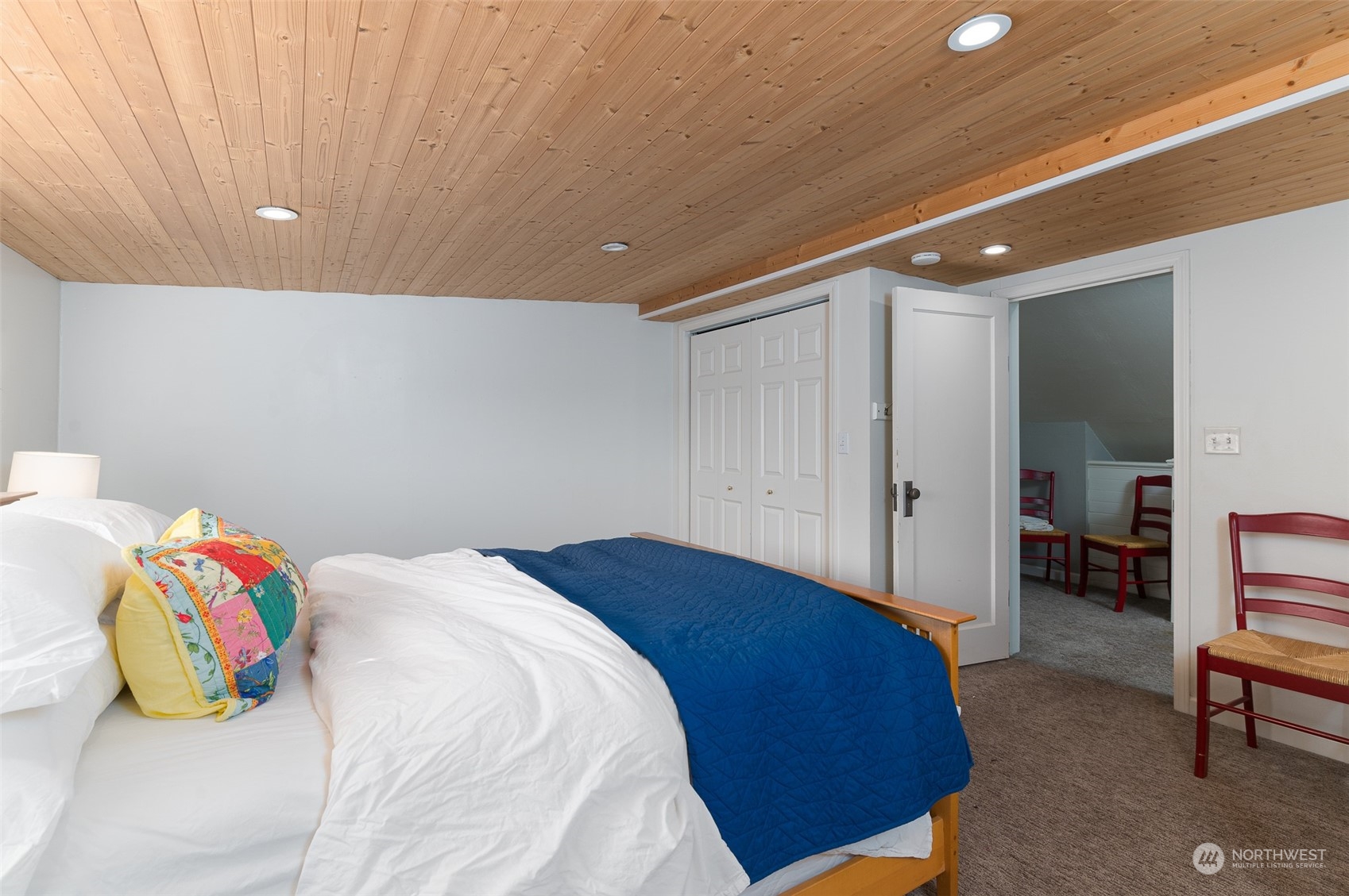 5757 Barr Road Ferndale, WA 98248 - Photo 18 of 40 a bedroom with a bed and a chair