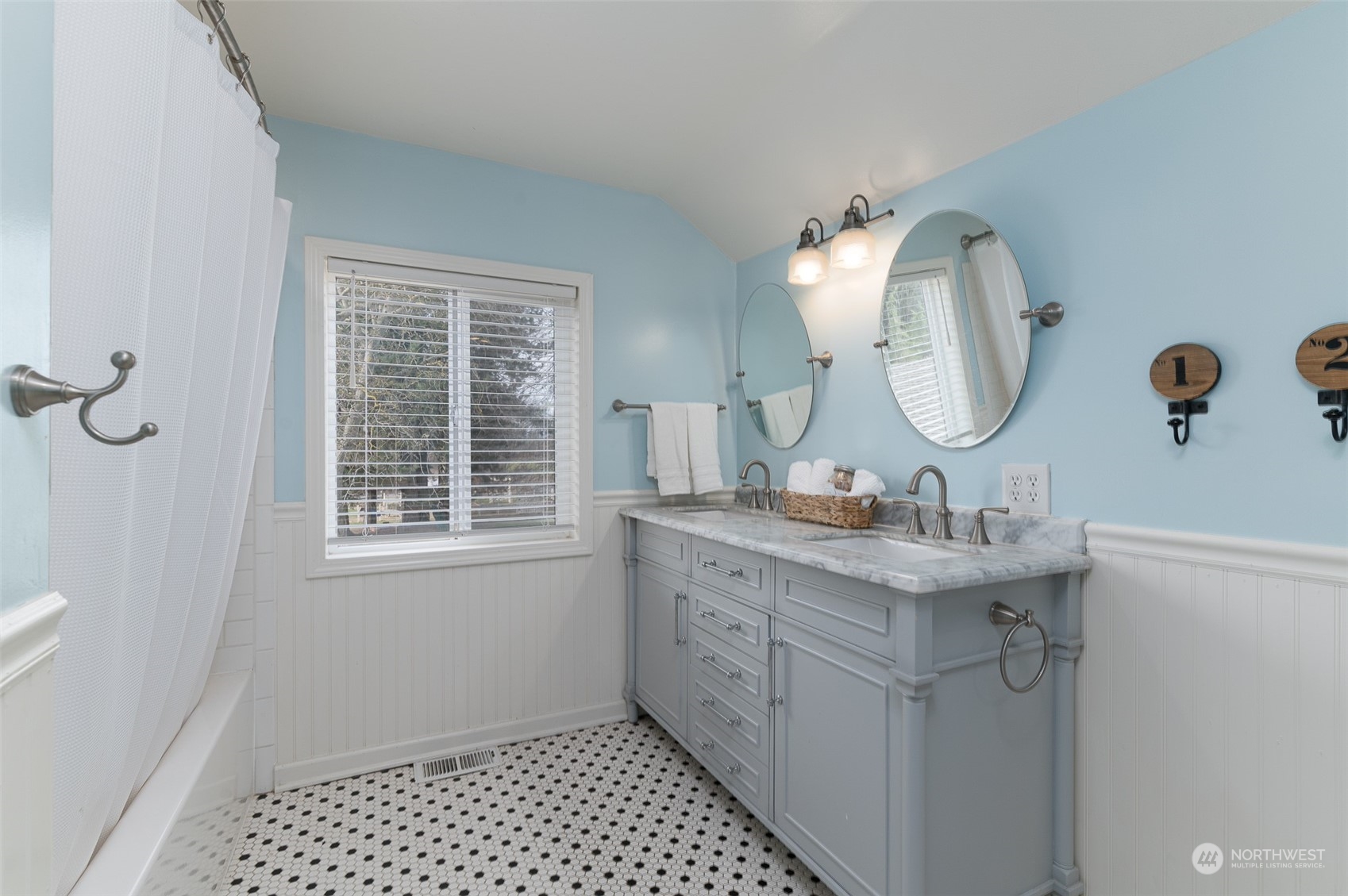 5757 Barr Road Ferndale, WA 98248 - Photo 20 of 40 a bathroom with a granite countertop sink mirror and vanity