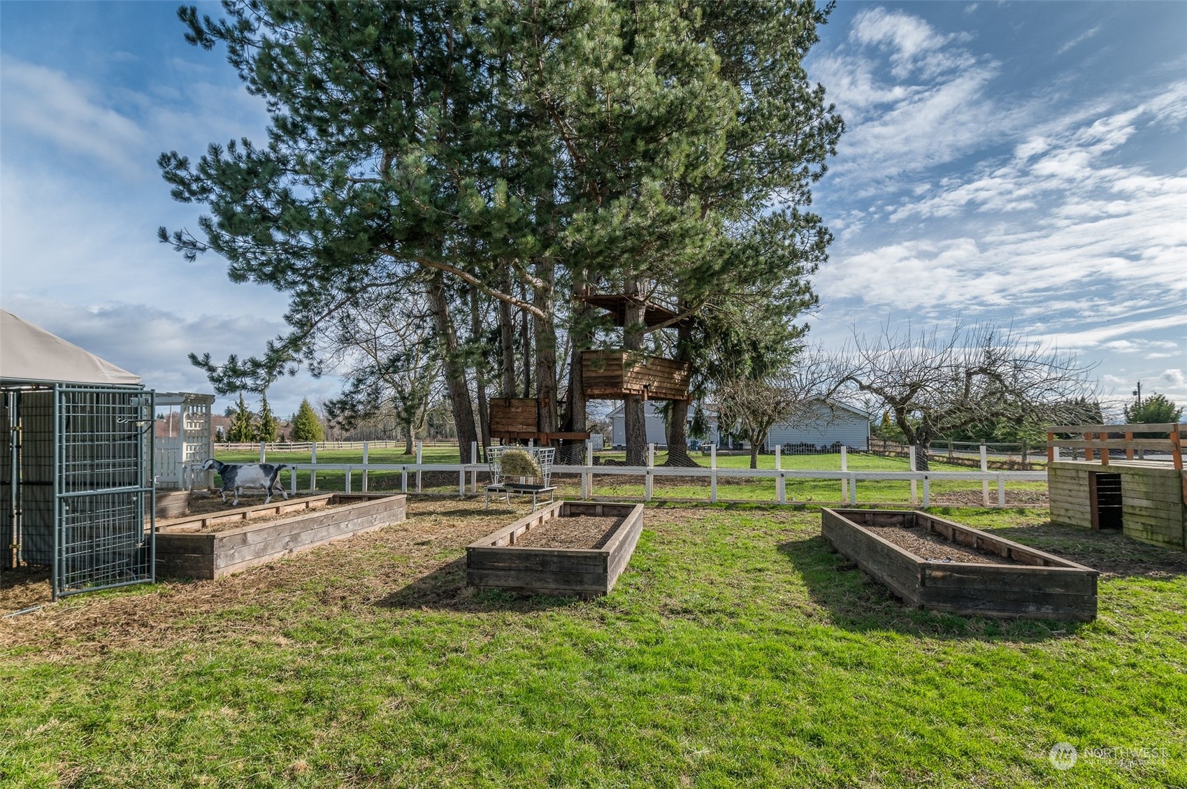 5757 Barr Road Ferndale, WA 98248 - Photo 33 of 40 a view of a swimming pool with a table and chairs