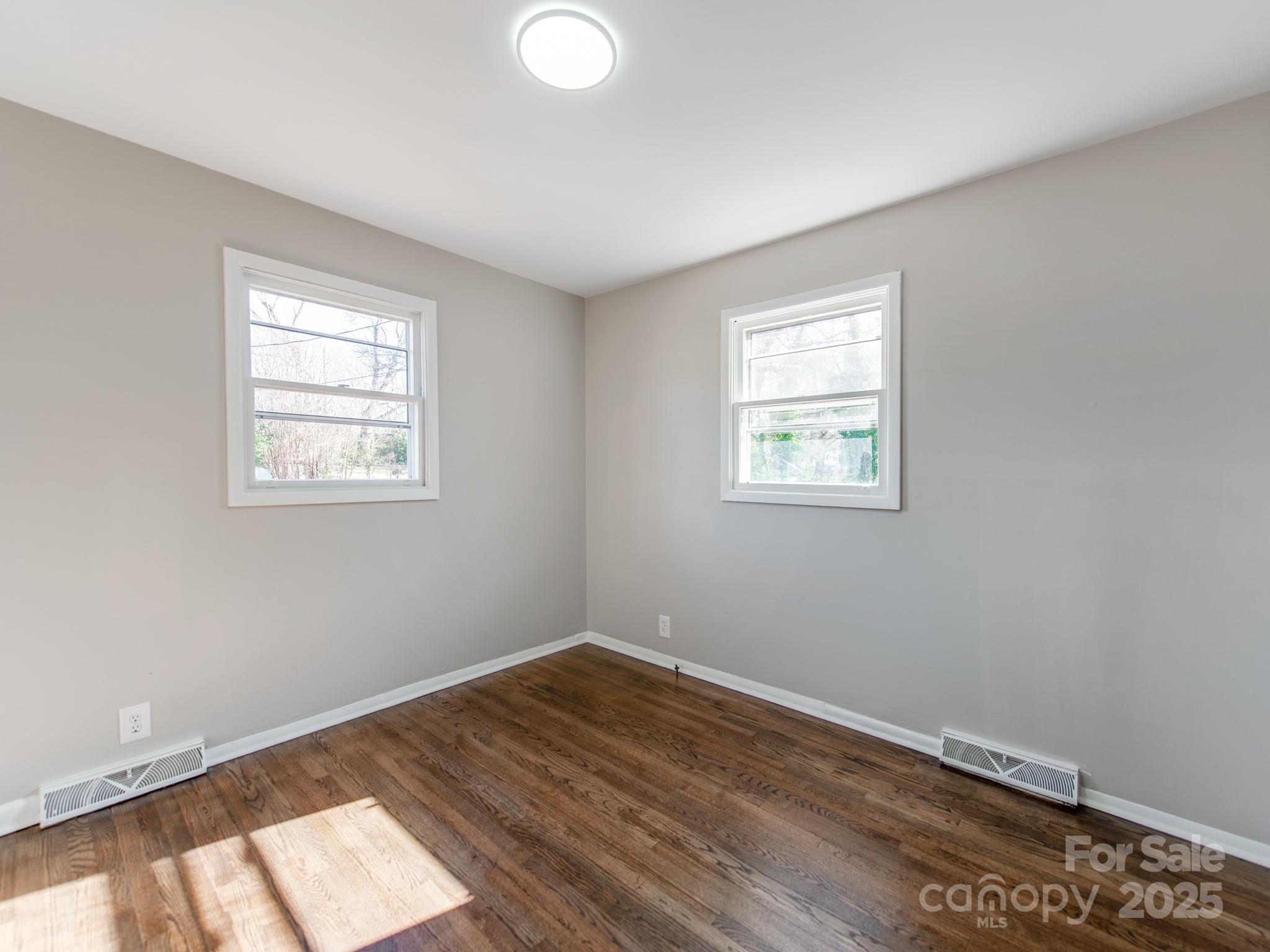 502 McConnell Street Clover, SC 29710 - Photo 14 of 25 a view of empty room with wooden floor