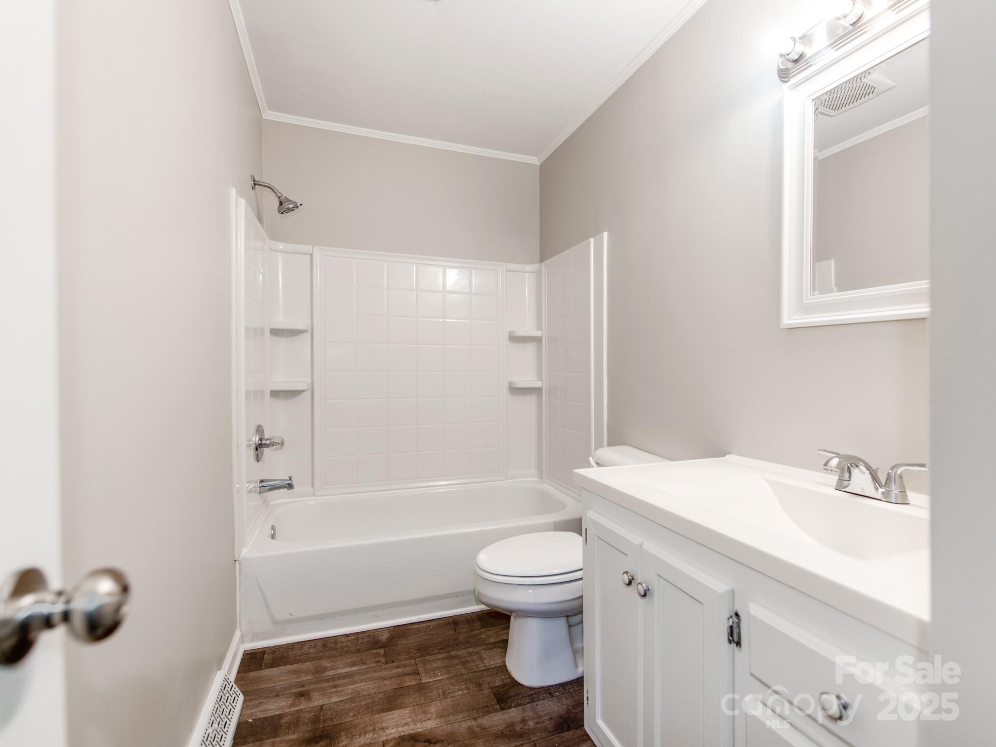 502 McConnell Street Clover, SC 29710 - Photo 20 of 25 a bathroom with a sink toilet and shower