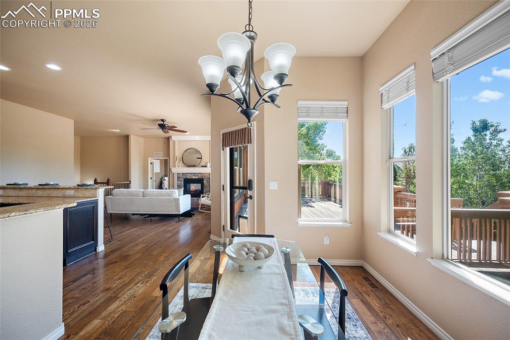 1117 Spectrum Loop Colorado Springs, CO 80921 - Photo 6 of 31 a view of living room with furniture and a chandelier