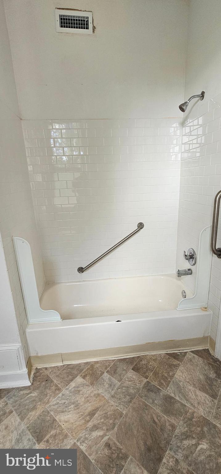 3618 Spring Garden Street Philadelphia, PA 19104 - Photo 21 of 41 a view of bathtub in shower