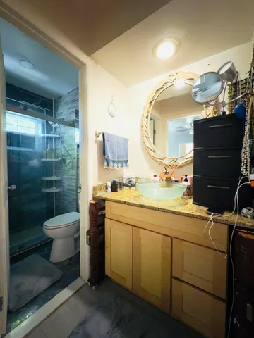 a view of a patio with a table and chairs