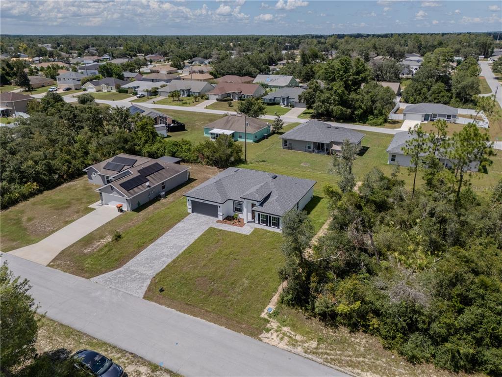 14245 Southwest 28th Court Ocala, FL 34473 - Photo 11 of 85 an aerial view of residential houses with outdoor space