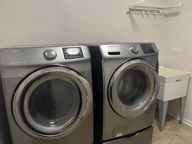 a utility room with dryer and washer
