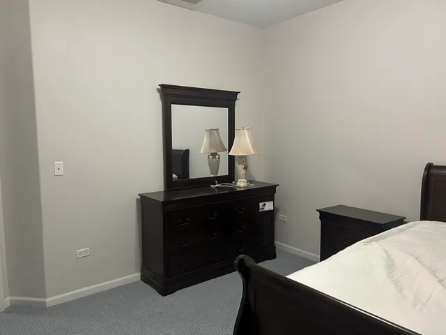 a room with a table and chairs