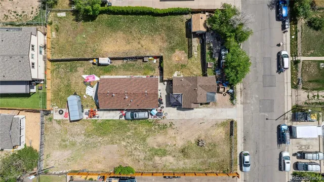 aerial view of a house with a garden