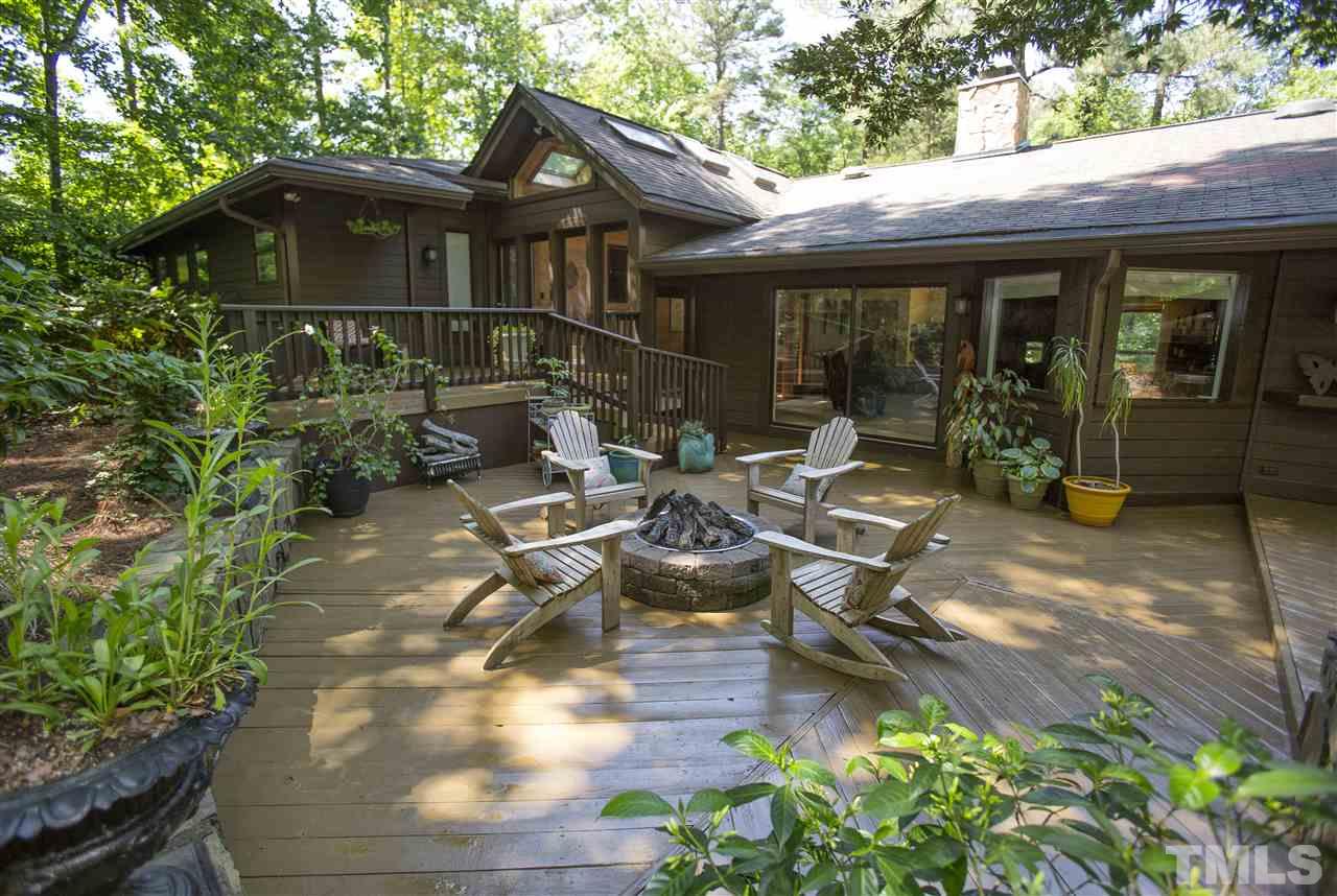 813 Thatcher Way Raleigh, NC 27615 - Photo 3 of 25 a view of backyard of house with outdoor seating