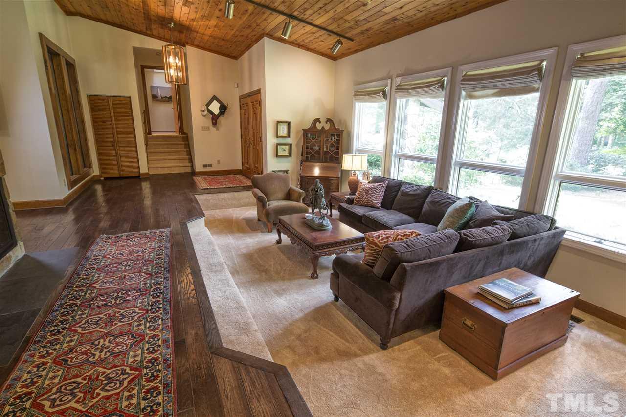 813 Thatcher Way Raleigh, NC 27615 - Photo 10 of 25 a living room with furniture and a rug