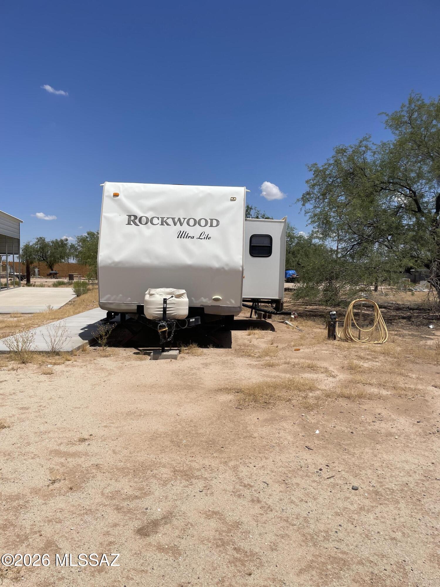 8535 South Marstellar Road Tucson, AZ 85736 - Photo 9 of 30 Back of Rockwood camper w slide out