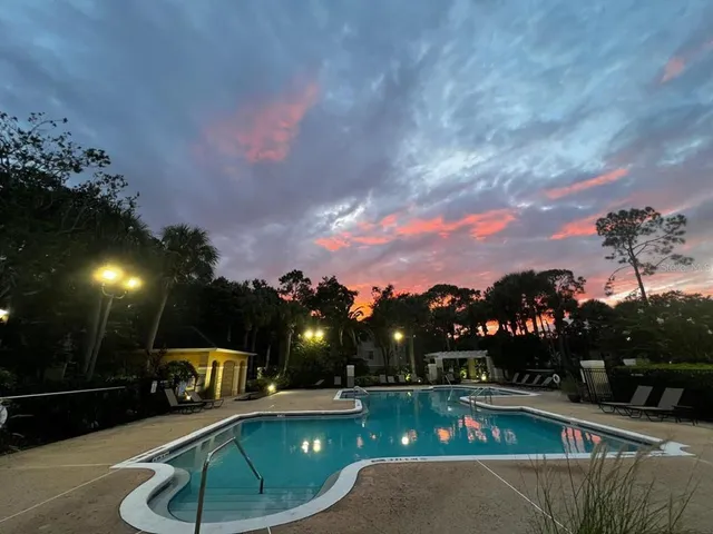 a outdoor space with lots of swings and slides