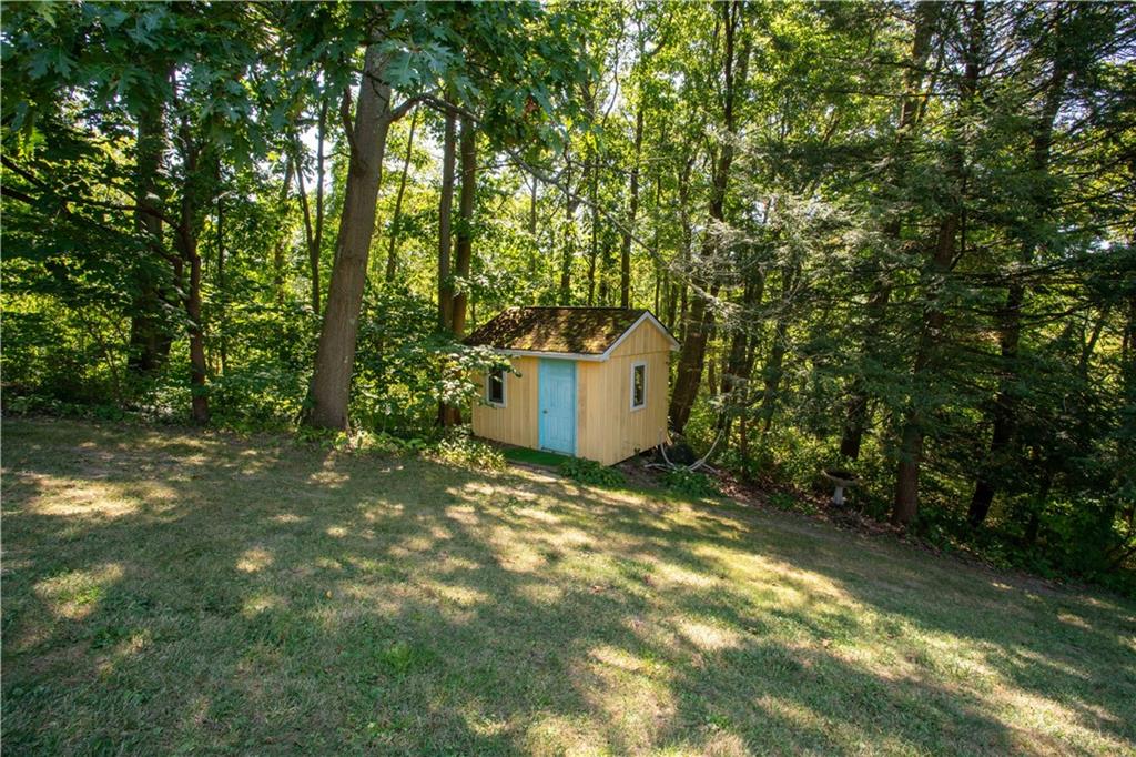 2145 Gypsy Glen Road Beaver, PA 15009 - Photo 38 of 46 a backyard of a house with a yard and outdoor seating