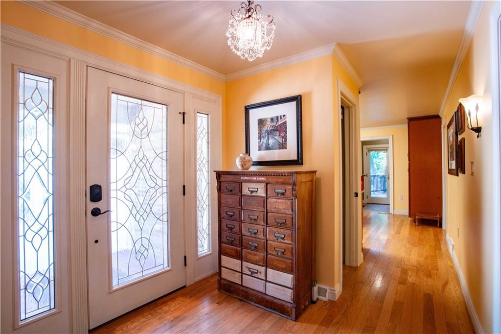 2145 Gypsy Glen Road Beaver, PA 15009 - Photo 6 of 46 a view of a hallway with wooden floor and door