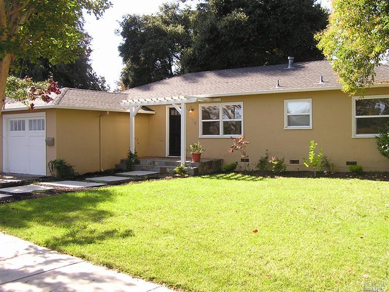 529 Shortt Road Santa Rosa, CA 95405 - Photo 1 of 1 a backyard of a house with yard and outdoor seating
