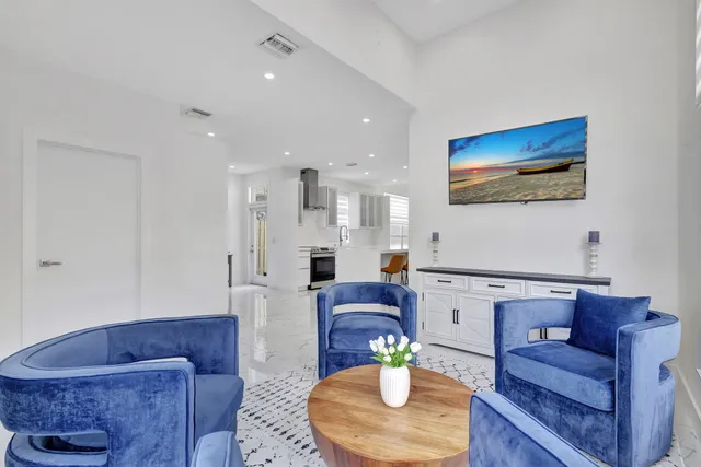 a view of livingroom with furniture and windows