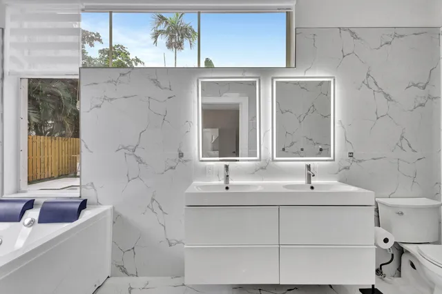 a bathroom with a sink and a bathtub