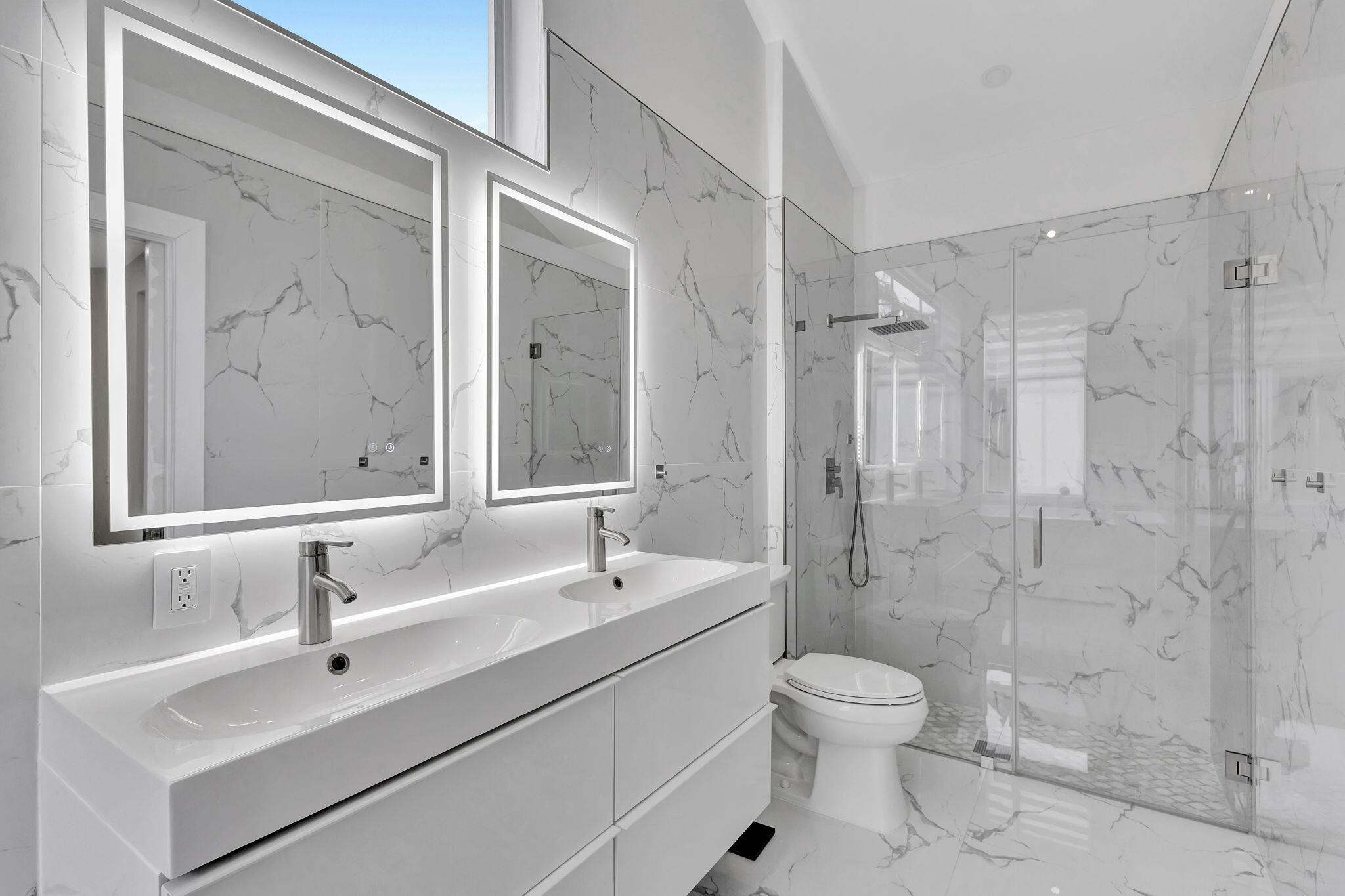 6631 Northwest 25th Avenue Boca Raton, FL 33496 - Photo 24 of 59 a bathroom with a sink toilet a mirror and shower