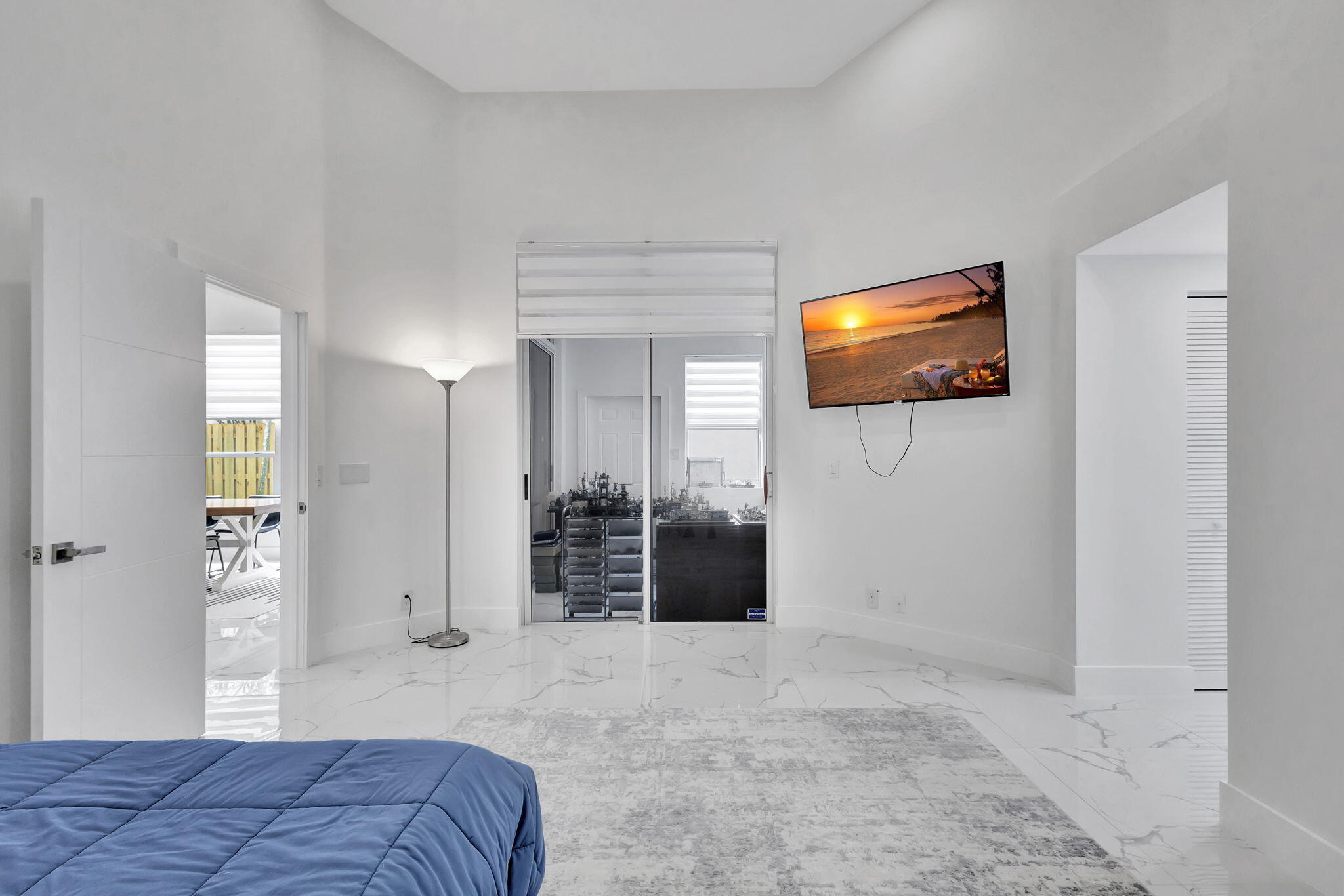 6631 Northwest 25th Avenue Boca Raton, FL 33496 - Photo 26 of 59 a bedroom with furniture and mirror