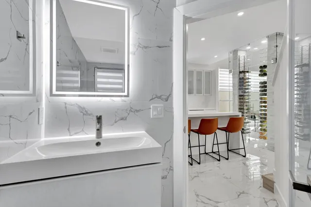 a bedroom with a bed and a chair