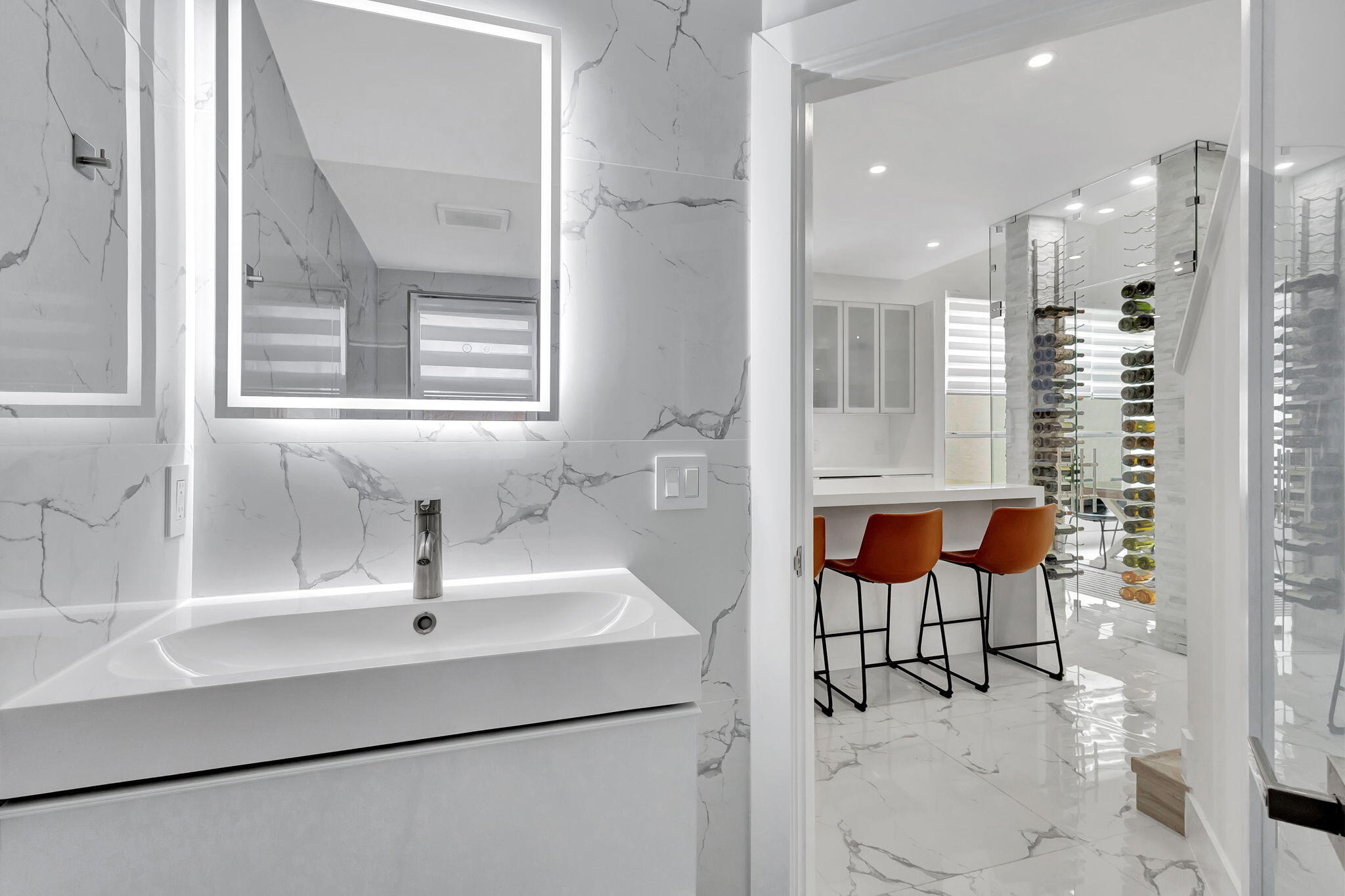 6631 Northwest 25th Avenue Boca Raton, FL 33496 - Photo 28 of 59 a bathroom with a sink and a mirror