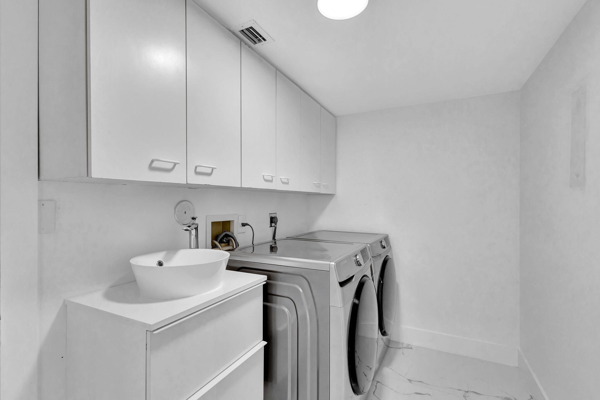 6631 Northwest 25th Avenue Boca Raton, FL 33496 - Photo 37 of 59 a utility room with dryer and washer
