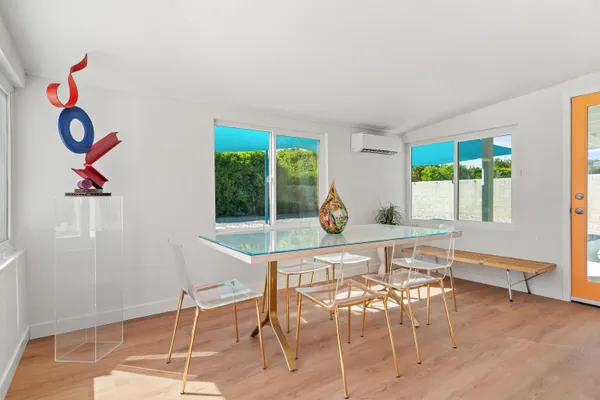 a view of room with furniture wooden floor and window