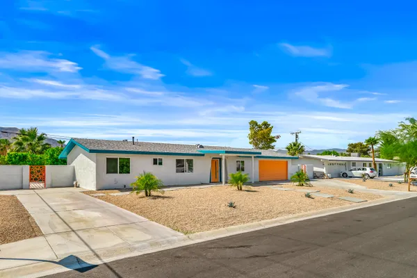 a house view with a outdoor space