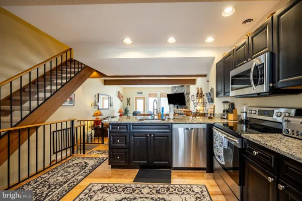 a kitchen with lots of appliances