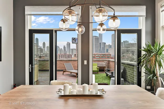 a view of a living room and a chandelier