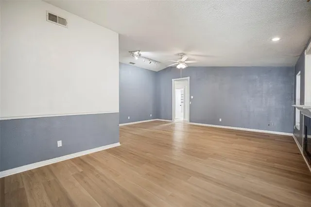 a view of a kitchen with a sink dishwasher and a window