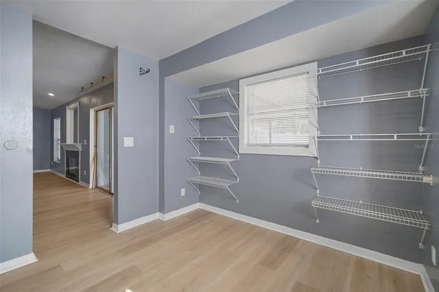 a empty closet with white paint