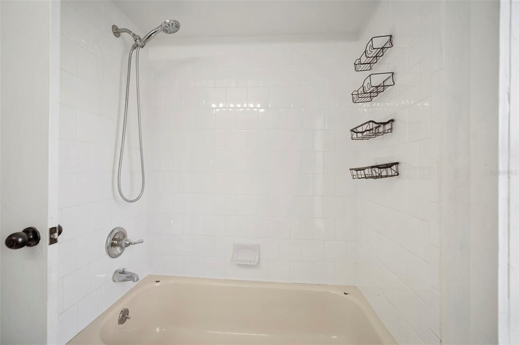 12825 Tallowood Drive Riverview, FL 33579 - Photo 35 of 43 a bathroom with a shower
