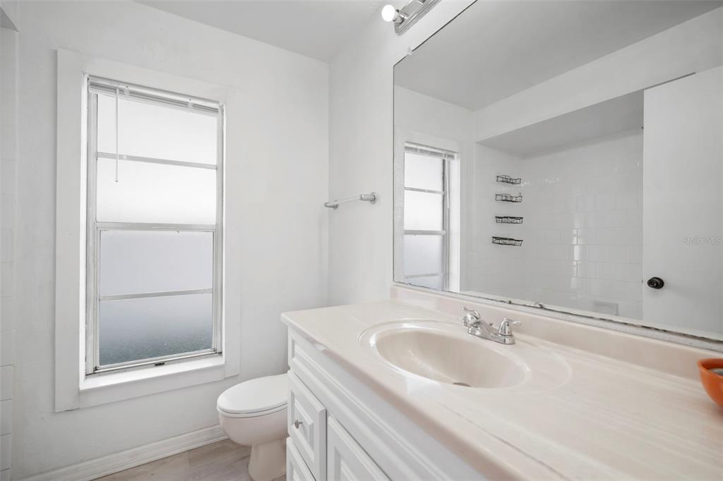 12825 Tallowood Drive Riverview, FL 33579 - Photo 36 of 43 a bathroom with a sink toilet and shower