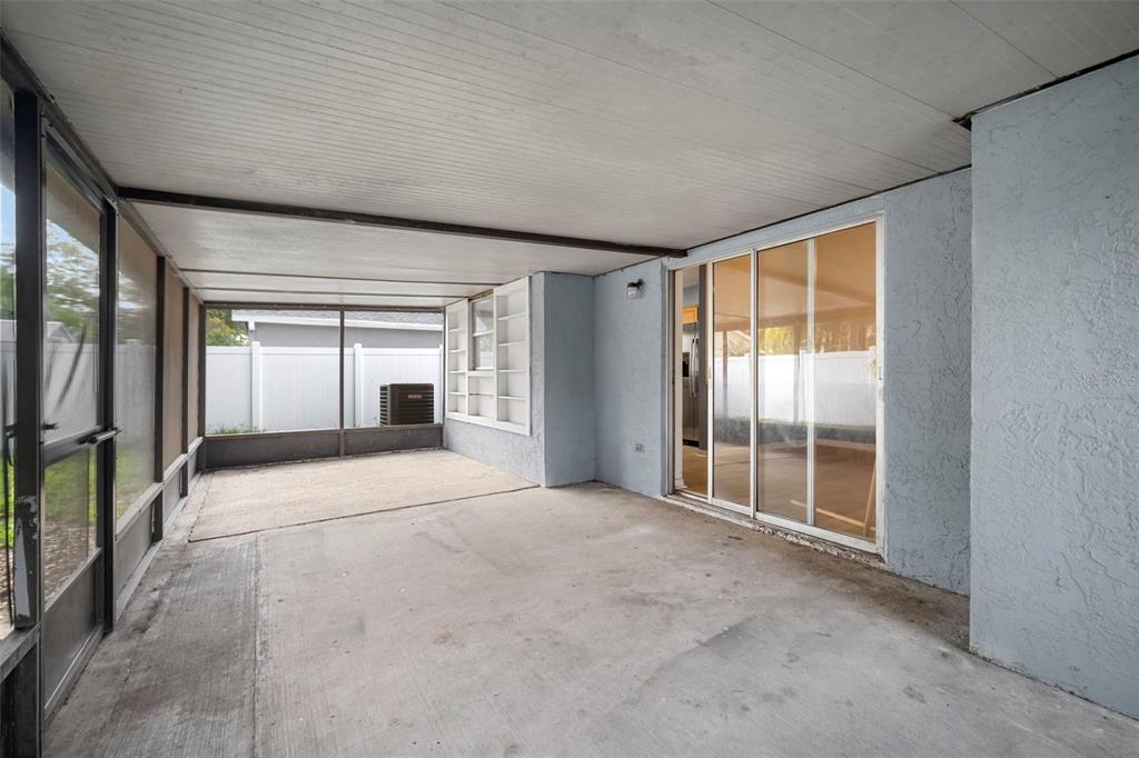 12825 Tallowood Drive Riverview, FL 33579 - Photo 39 of 43 a view of empty room with floor to ceiling window