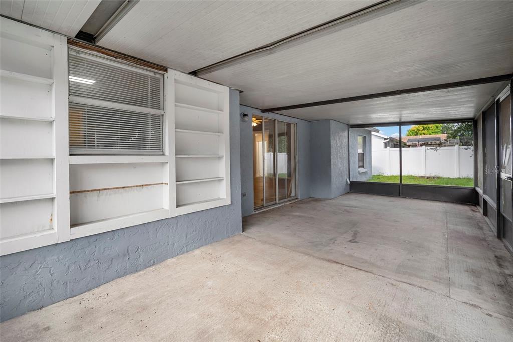 12825 Tallowood Drive Riverview, FL 33579 - Photo 40 of 43 a view of an empty room with a window