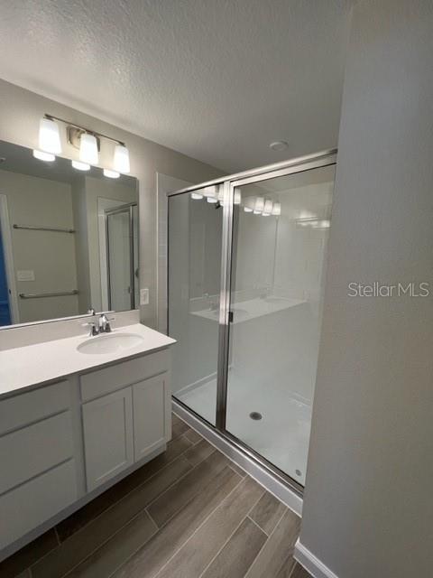 2327 Prickly Pear Way Sanford, FL 32771 - Photo 12 of 33 a bathroom with a double vanity sink and mirror
