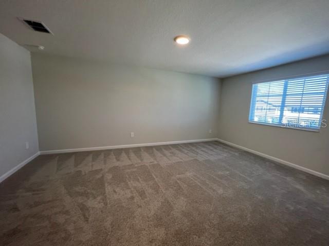 2327 Prickly Pear Way Sanford, FL 32771 - Photo 14 of 33 an empty room with windows